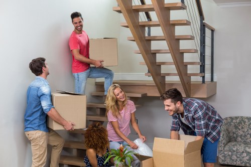 Professional Manwithvan team handling furniture delivery
