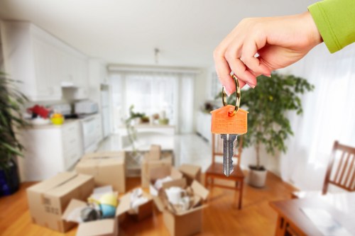 Packing fragile items with care by professional movers