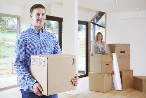 Customers loading their belongings into a Manwithvan truck