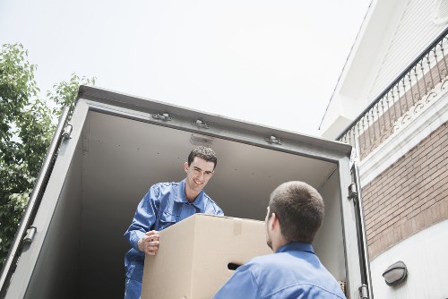Manwithvan team packing items efficiently for a move